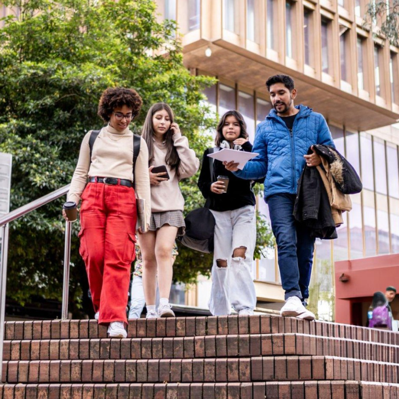 Students walking down campus stairs