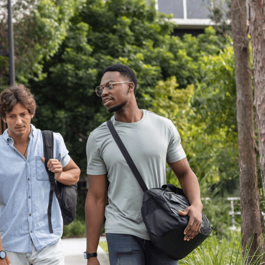 Students walking in campus park